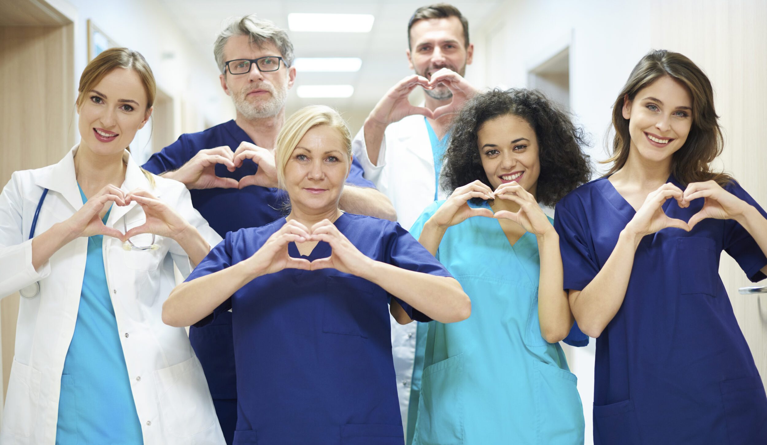 Group of doctors with heart symbol